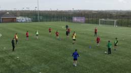 coach conducting a football coaching session