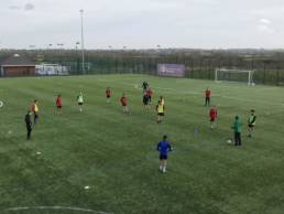 coach conducting a football coaching session