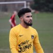 Footballer looking focused whilst wearing Nike kit with "Only Jerkin" sponsor logo