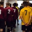 Footballers lining up before a match in the tunnel with their squad numbers visible