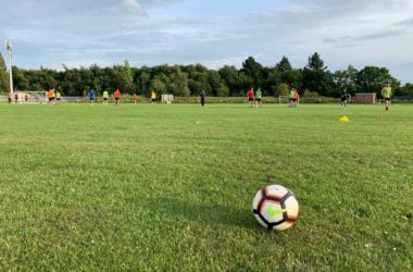 A wide shot of a football training session