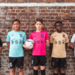 Children modelling Bloomsbury Football's range of Nike football kits in different colours
