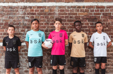 Children modelling Bloomsbury Football's range of Nike football kits in different colours