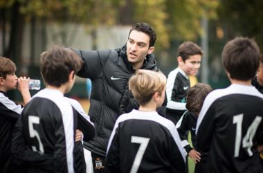 Bloomsbury Football players being coached