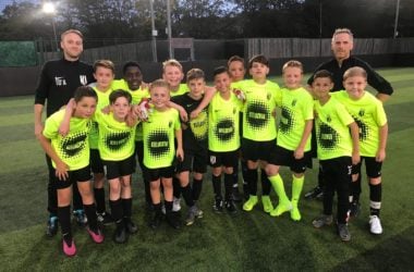 Kitlocker Juniors team photo with players and coaches.