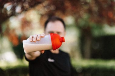 Man holding a protein shake